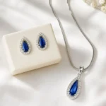 Elegant blue crystal drop Pendant necklace and earrings set for women by Mellafex