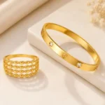 Elegant gold plated bracelet and layered ring combo set for women by Mellafex