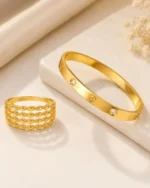 Elegant gold plated bracelet and layered ring combo set for women by Mellafex