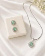Elegant mint green crystal pendant and earrings set for women by Mellafex